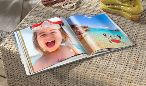 Urlaubsstimmung für Zuhause: Fotobücher sind ein beliebter Klassiker, um Erinnerungen dauerhaft festzuhalten. Foto: djd/www.pixum.de